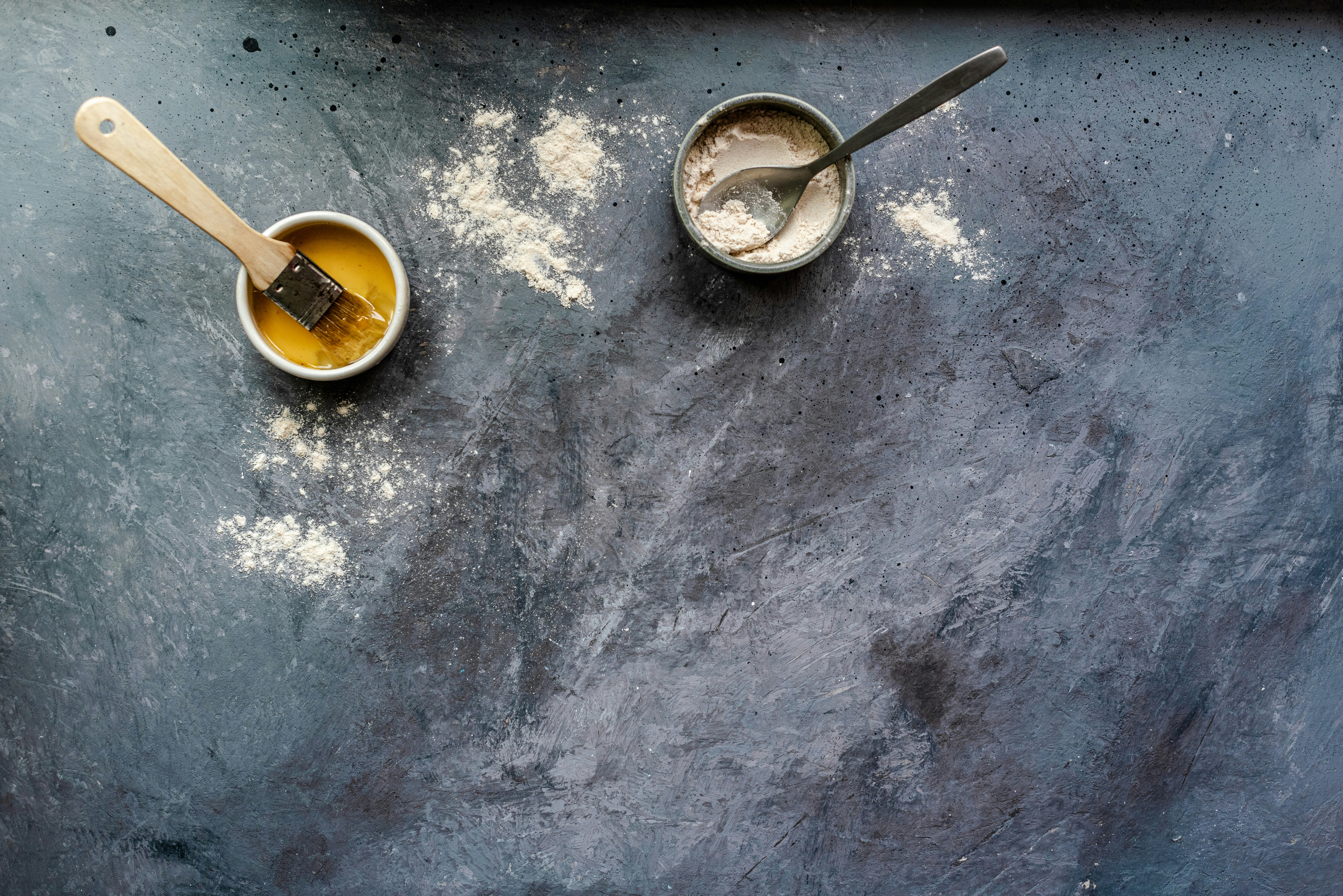 stainless steel spoon on round brown ceramic bowl